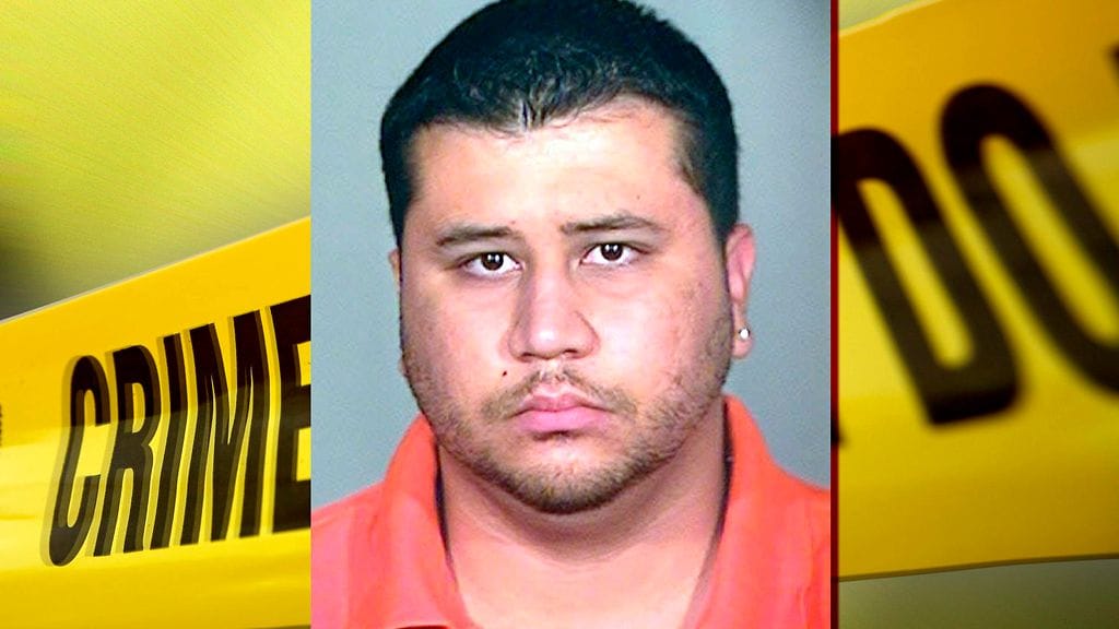 Poliisin kuva George Zimmermanista pidätyksen jälkeen 20.3.2012.