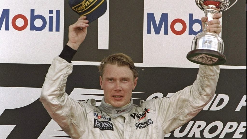 Mika Häkkinen juhlii ensimmäistä kisavoittoaan Jerezissa 1997.
