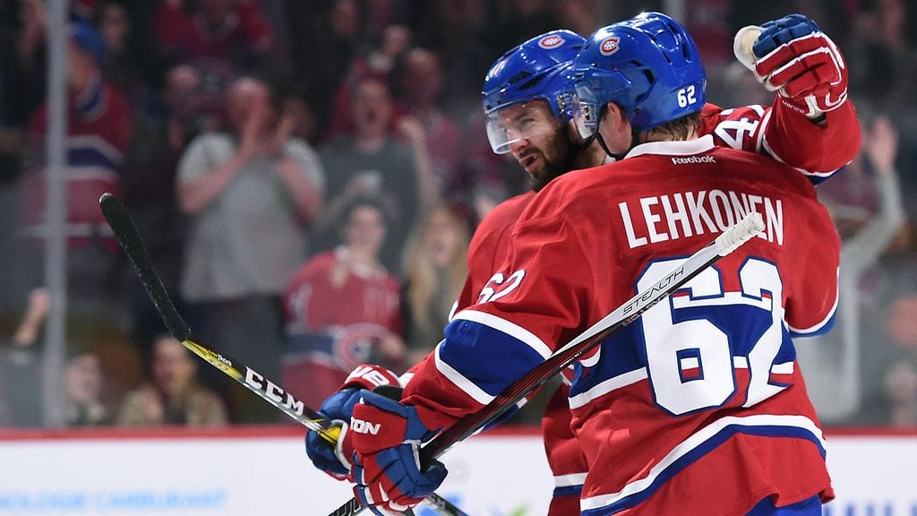 Aleksander Radulov onnittelee Artturi Lehkosta maalista.