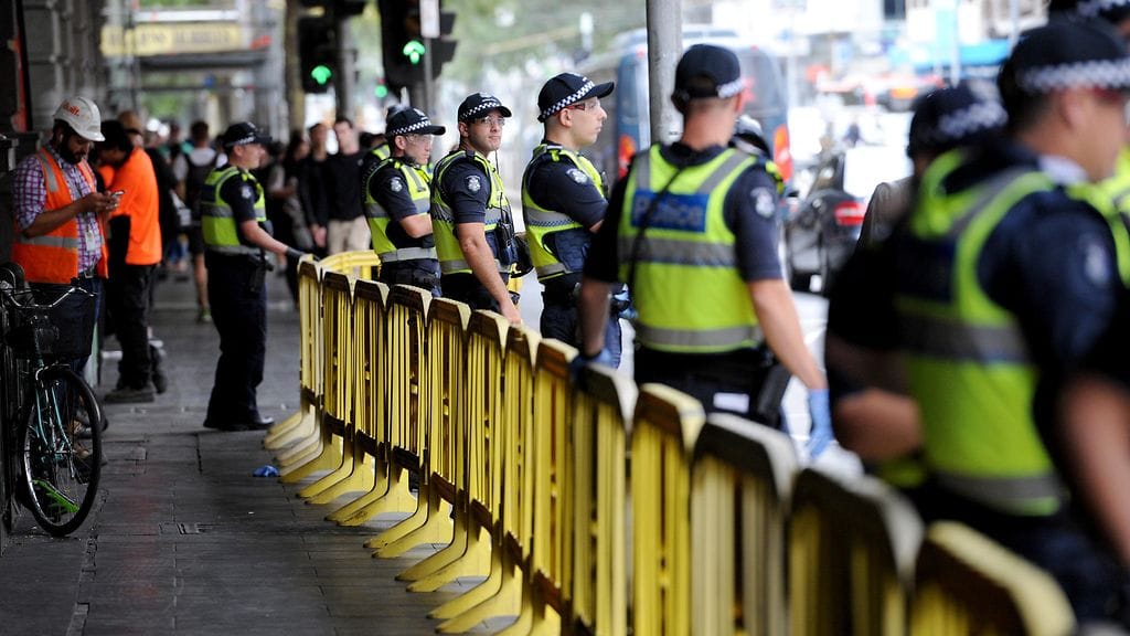 Australialaispoliiseja Melbournessa. Kuvituskuva.