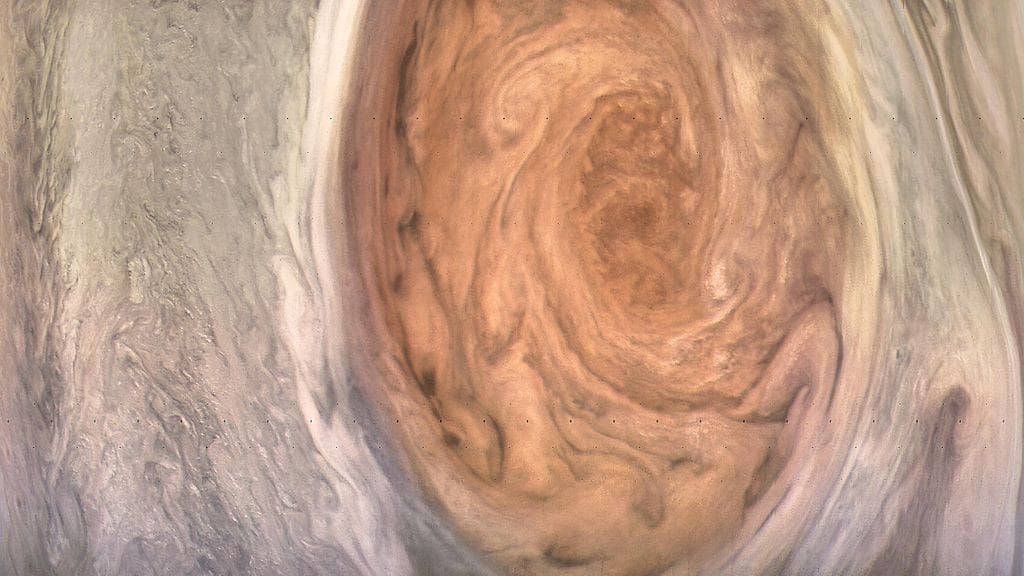 This enhanced-color image of Jupiter’s Great Red Spot was created by citizen scientist Kevin Gill using data from the JunoCam imager on NASA’s Juno spacecraft.