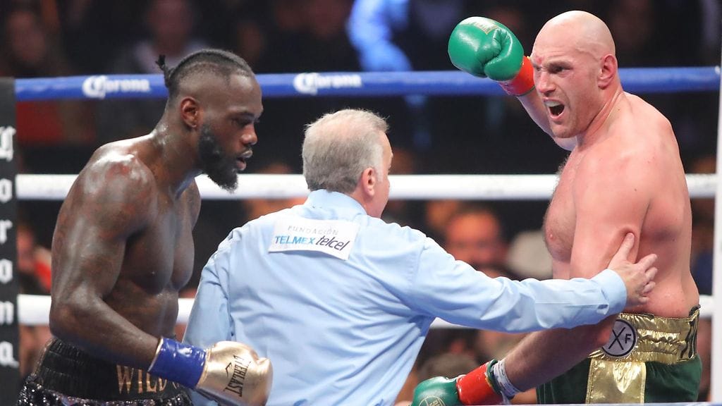 Deontay Wilder (vasemmalla) ja Tyson Fury (oikealla) kohtaavat uusintaottelussa, jossa ratkaistaan raskaan sarjan WBC-liiton mestaruustitteli.